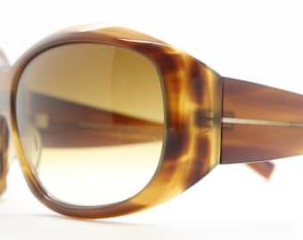 Oliver Peoples vintage Y2K wrap around sunglasses model Vanadis made in Japan. Big bug eye with tall arms in mottled brown acetate frame