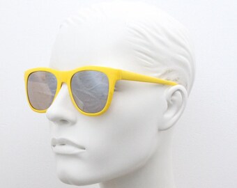 Vintage 80s square sunglasses. All time classic design in canary yellow with silver mirror lenses. Party monster magnet shades. NOS