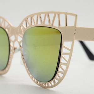 Y2K vintage metal cat eye sunglasses. Women&#39;s extraordinary gold cut out lattice scaffold cateye frame with gold mirror lenses. 2000s. BNWT