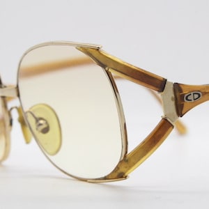 Christian Dior 70s vintage round eyeglasses model 2524 made in Germany from Optyl. Transparent brown optical frame. Prescription eyeglasses