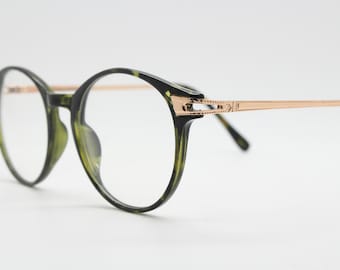 90s vintage round glasses with tortoise front and gold embossed arms. 40s, 50s style prescription optical frames. Clear lens eyeglasses. RX
