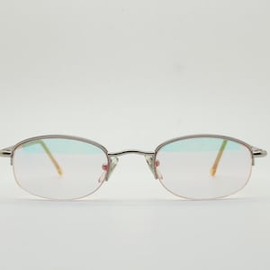 90s vintage small rectangular sunglasses. Silver chrome half frame with light tone lenses with gold mirror glaze. 2000&#39;s. Y2K. NOS micro