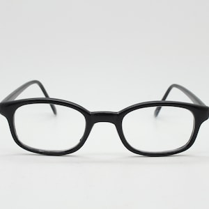 80s vintage low profile wayfarer style glasses. Black acetate optical frames with clear lenses. Prescription eyeglasses. RX Spectacles. NOS