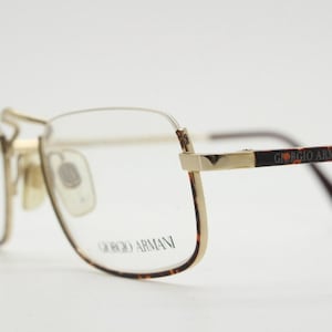 Giorgio Armani rectangular eye glasses made in Italy. Half frame underwire with metallic tortoise enamel. Prescription optical eyeglasses RX