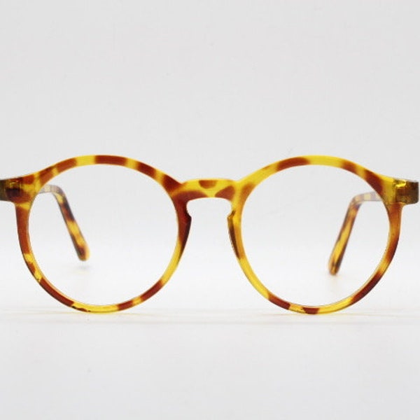 90s vintage round glasses. 30s, 40s design optical frames in a vibrant honey tortoise finish. Prescription eyeglasses. Spectacles.O Malley