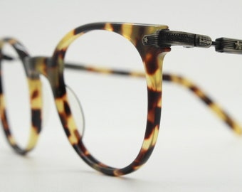 Sting 90s vintage round eye glasses made in Italy. Honey tortoise acetate optical frames. 40s retro design. Prescription eyeglasses. RX