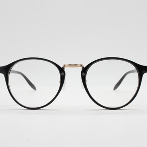 90s vintage slender frame glasses. Black with gold bridge optical frames. 40s, 50s style prescription eyeglasses. Clear lens eyeglasses. RX