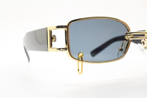Vintage low profile sunglasses. Rectangular gold … - image 1