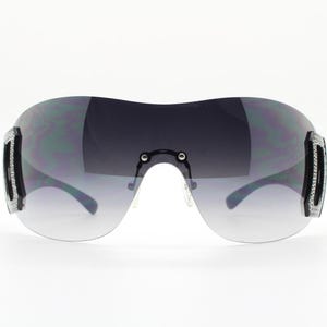 Y2K vintage visor sunglasses. 2000&#39;s black wraparound mono lens shield design with big diamante effect crest. 00s uber fashion mini mask NOS