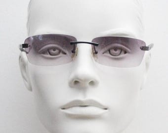 90s vintage minimal frameless sunglasses. Minimal mulberry rectangular lenses with gunmetal grey trim and frosted arms. Matrix shades