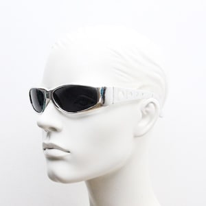 90s vintage visor sunglasses. Hyper real metallic silver superhero style mini mask sport shield with black lenses. Wrap around. NOS cosplay
