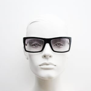 Y2k vintage wrap around large rectangular sunglasses. Curved black gloss frame with tasteful graduating lenses. 2000&#39;s NOS