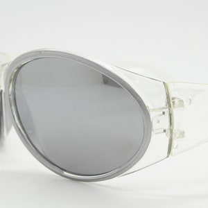 90s vintage futuristic oversized bug eye sunglasses. Dynamic transparent clear wrap around sporty shield frame. 2000s goggle Y2K. Unused NOS