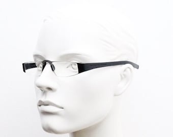Porsche design rectangular eye glasses. Minimal grey metal optical frame in a matt finish with black arms. Vintage Prescription spectacles