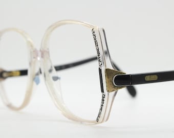 Gafas Silhouette hexagonales vintage de los años 80, fabricadas en Austria. Montura de cristal transparente y dinámica con diseño abstracto. Graduadas.