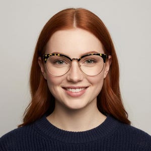 90s vintage modified cat eye glasses. Tortoise browline half frame eyeglasses with gold underwire. 50s, 60s design cateye. NOS