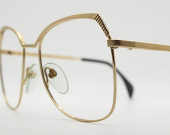 Silhouette 70s vintage eye glasses made in Austria. Womens sophisticated oversized angular gold optical frame. Prescription eyeglasses. Rx