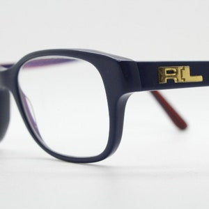 Ralph Lauren rectangular eye glasses model 6119. Navy blue acetate optical frame with red interior. Prescription eyeglasses. RX spectacles