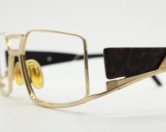 Cazal 80s vintage rectangular eye glasses. Extraordinary open sided optical frames with dark leopard print. Prescription eyeglasses. RX