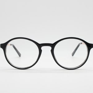 90s vintage round glasses. 30s, 20s style black optical frames with gold arms. Prescription eyeglasses with clear lenses. RX spectacles. NOS