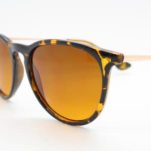 90s vintage sunglasses. Tortoise gloss frame with warm amber lenses. BNWT. NOS
