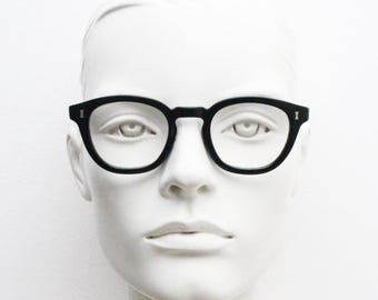 Cubitts vintage round 40s design Moreland eye glasses. Plain black gloss acetate optical frame with keyhole bridge. Prescription RX