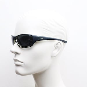 Y2K vintage sport shield sunglasses. All matt black wraparound aerodynamic visor with light green outline. 2000&#39;s. 90s. Unused NOS