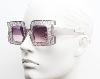 Vintage oversized square sunglasses. Women's radical fashion poseur shades with abstract patterned transparent frame with pink lenses. BNWT