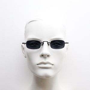 90s vintage small rectangular sunglasses. Imposing minimal gunmetal grey victorian style frame with black lenses. Steampunk. Unused NOS