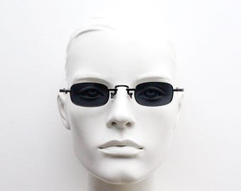 90s vintage small rectangular sunglasses. Imposing minimal gunmetal grey victorian style frame with black lenses. Steampunk. Unused NOS