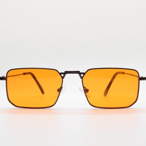 90s vintage angular 6 sided sunglasses. Brown chrome metal frame with blazing flat orange lenses. Rectangular psychedelic sunnies. BNWT