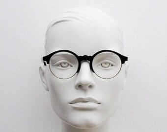 Occhiali da vista rotondi Kaleos con montatura a mezza montatura