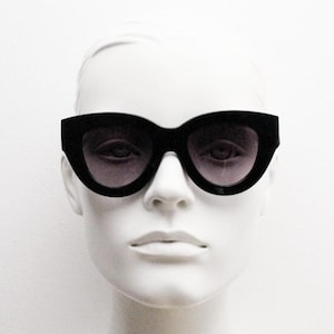 Y2K vintage thick oversized cateye sunglasses. Womens black gloss big arm cat eye frame with gradient lenses. 2000s NOS