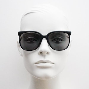 80s vintage flexible square sunglasses. Plain matt black frame with slight gold mirror glaze lens tone. Unused NOS. Rave