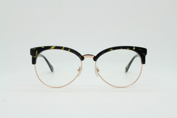 90s vintage modified cat eye glasses. Tortoise br… - image 1
