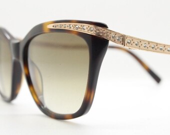 Borsalino cat eye sunglasses made in Italy model 250. Womens Tortoise acetate frame with dramatic diamante golden arms. Rhinestone cateye
