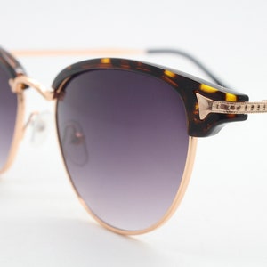90s vintage cateye sunglasses. Womens 50s, 60s design cat eye with tortoise browline and gradient smoky lenses. NOS