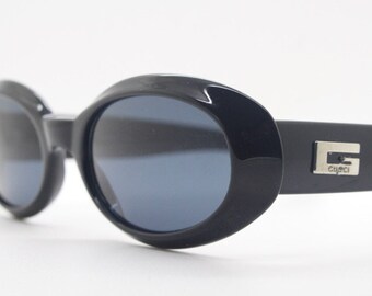 Gucci vintage 90s sunglasses model 2419 made in Italy. All black low profile small mini goggle design in gloss acetate