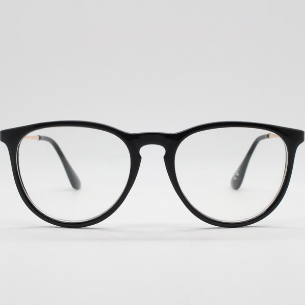 90s vintage black slim glasses. Slightly oversized optical frames in black gloss. Prescription eyeglasses with clear lens. RX spectacles