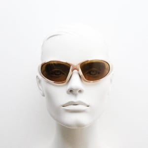 90s vintage big sport shield sunglasses. Wrap around bug eye frame with desert cammo print. 2000s. Camouflage NOS. Ravers fashion grail