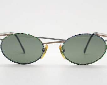 Taxi 90s vintage oval sunglasses. Unique innovative abstract design with extraordinary multi colour print. Casanova
