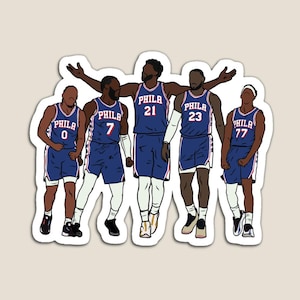 May include: A sticker illustration of five basketball players wearing blue Philadelphia uniforms with white trim. The players are numbered 0, 7, 21, 23, and 77. Each jersey features the text PHILA across the chest in white lettering with red outlines.