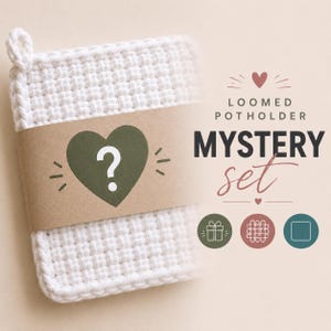 May include: A white, loomed pot holder with a brown paper band featuring a green heart with a white question mark. The text "MYSTERY set" is displayed in black and pink. Decorative icons are also present.