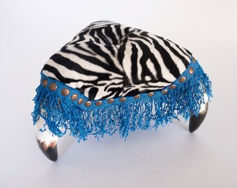 Zebra pattern monster stool with horns, unique decor item