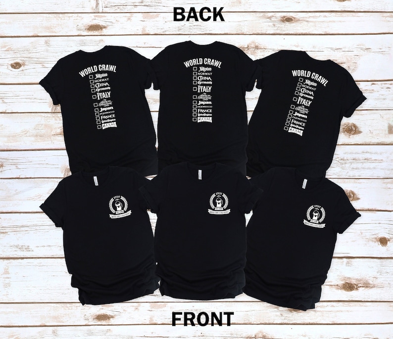 May include: Three black t-shirts with a white graphic on the back that says "WORLD CRAWL" with a checklist of countries. The front of the shirts have a white graphic of a crown with a beer mug inside and the text "WORLD CRAWL CLUB".