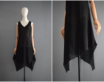 Vintage 1990s Black Semi Sheer Asymmetrical Dress | 90s Sheer Sleeveless Shift Dress | V-neck Asymmetric Hem Pull On Dress | S