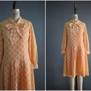 Vintage 1960s Peach and Ivory Long Sleeve Geometric Print Dress | 60s Peach Tie Neck Drop Waist Dress | M