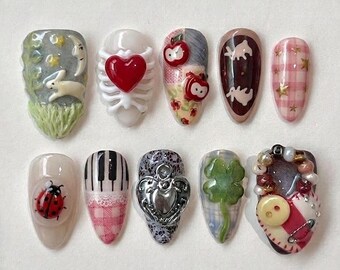 Handmade Press On Nails | Whimsical Cottagecore | 3D Skeleton Heart, Runny Bunny, Red Apple, Four-Leaf Clover & Piano Lace Set