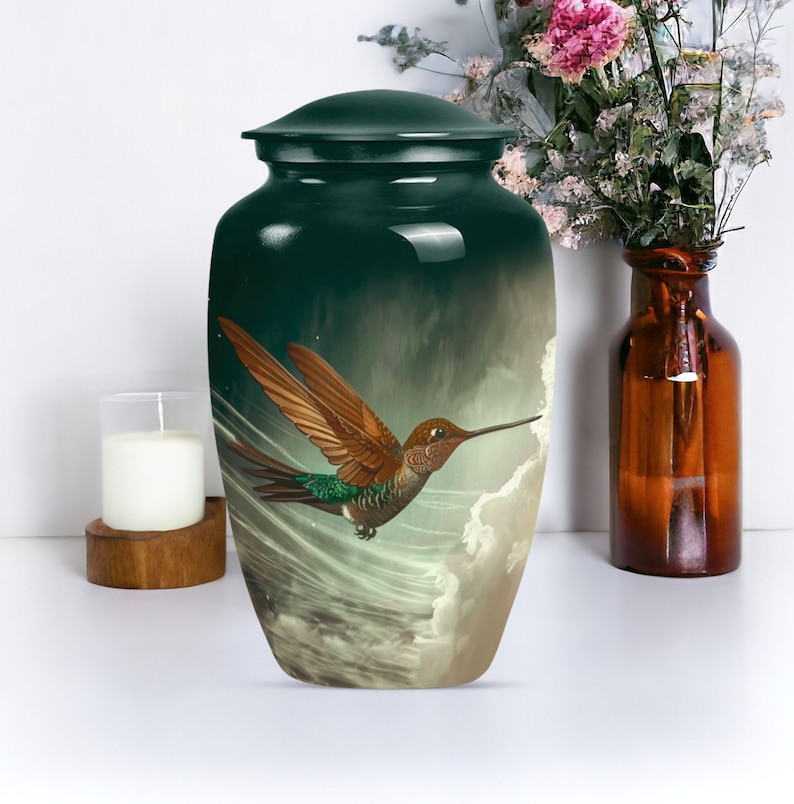 High-quality cremation urn with artistic green hummingbird design.