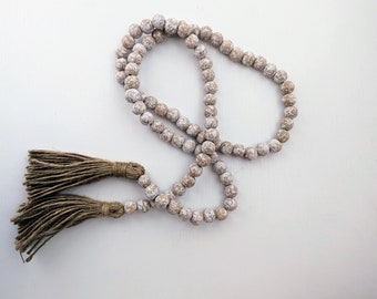 Beaded garland with tassels